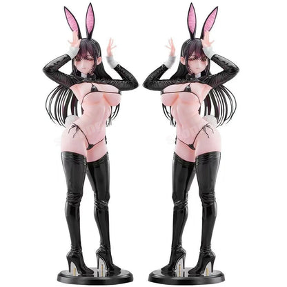 Two figurines of a character with bunny ears and black leather outfit on a white background